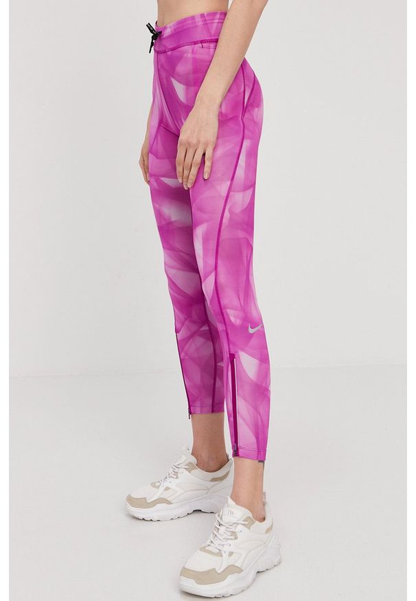 Nike - Legginsy. Kolor: różowy. Materiał: dzianina, materiał, tkanina, włókno, skóra. Technologia: Dri-Fit (Nike)