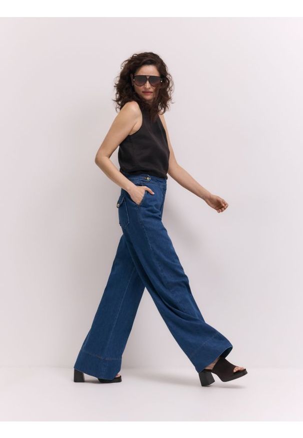 Reserved - Jeansy wide leg - niebieski. Kolor: niebieski