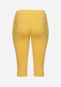 Born2be - Żółte Spodnie z Bawełny o Kroju Capri Dolonisa. Okazja: na co dzień. Kolor: żółty. Materiał: bawełna. Styl: młodzieżowy, elegancki, casual