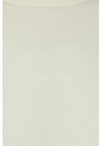 Calvin Klein bluza damska kolor żółty gładka. Okazja: na co dzień. Kolor: żółty. Materiał: włókno, dzianina. Długość rękawa: długi rękaw. Długość: długie. Wzór: gładki. Styl: casual #5