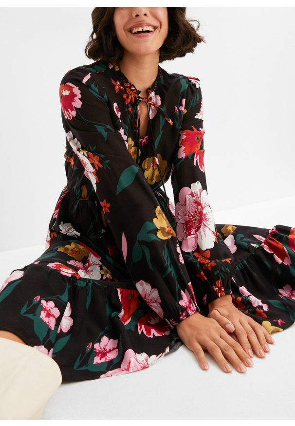 bonprix - Sukienka midi z lejącej wiskozy. Kolor: czarny. Materiał: wiskoza. Wzór: nadruk. Długość: midi