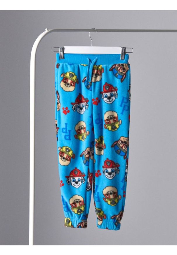 Sinsay - Polarowe spodnie Paw Patrol - beżowy. Kolor: beżowy. Materiał: polar