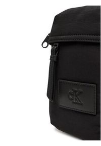 Calvin Klein Jeans Saszetka Metro Nylon Reporter Bag LV04G3089G Czarny. Kolor: czarny. Materiał: materiał #3