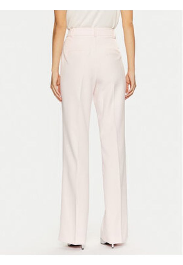 Guess Spodnie materiałowe W4YB30 WFWX2 Różowy Regular Fit. Kolor: różowy. Materiał: syntetyk