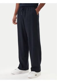 Emporio Armani Spodnie materiałowe EM000586 AF20590 UB102 Granatowy Regular Fit. Kolor: niebieski. Materiał: wiskoza, len #1