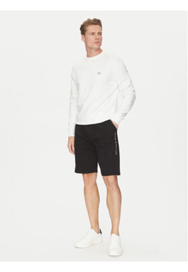 TOMMY HILFIGER - Tommy Hilfiger Szorty sportowe UM0UM03452 Czarny Regular Fit. Kolor: czarny. Materiał: syntetyk, bawełna. Styl: sportowy