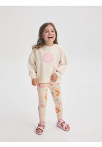 Reserved - Wzorzyste legginsy - kremowy. Kolor: kremowy. Materiał: bawełna