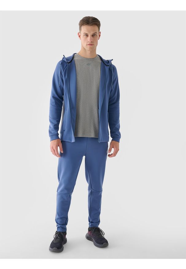 4f - 4F Bluza treningowa rozpinana z kapturem męska - niebieska 3XL. Okazja: na co dzień. Typ kołnierza: kaptur. Kolor: niebieski. Materiał: syntetyk, włókno, dzianina, materiał, elastan. Długość rękawa: raglanowy rękaw. Wzór: jednolity, gładki, ze splotem. Styl: casual, sportowy