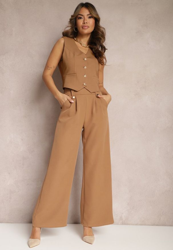 Renee - Brązowe Eleganckie Spodnie Dzwony z Ozdobnymi Patkami w Pasie Nattas. Stan: podwyższony. Kolor: brązowy. Styl: elegancki