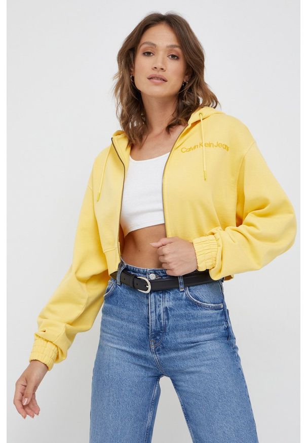 Calvin Klein Jeans bluza bawełniana damska kolor żółty z kapturem gładka. Typ kołnierza: kaptur. Kolor: żółty. Materiał: bawełna. Wzór: gładki