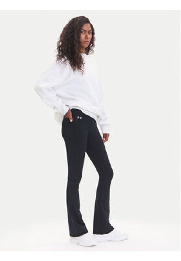 Under Armour Legginsy Motion 1379176 Czarny Slim Fit. Kolor: czarny. Materiał: syntetyk