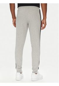 Adidas - adidas Spodnie dresowe adicolor 3-Stripes JY1387 Szary Slim Fit. Kolor: szary. Materiał: bawełna #4