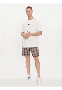 Adidas - adidas T-Shirt City Escape IR5175 Biały Loose Fit. Kolor: biały. Materiał: bawełna #5