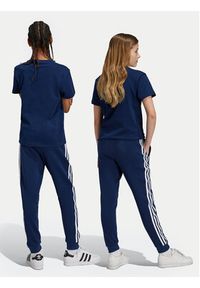 Adidas - adidas Spodnie dresowe Trefoil IY7486 Granatowy Regular Fit. Kolor: niebieski. Materiał: bawełna #3