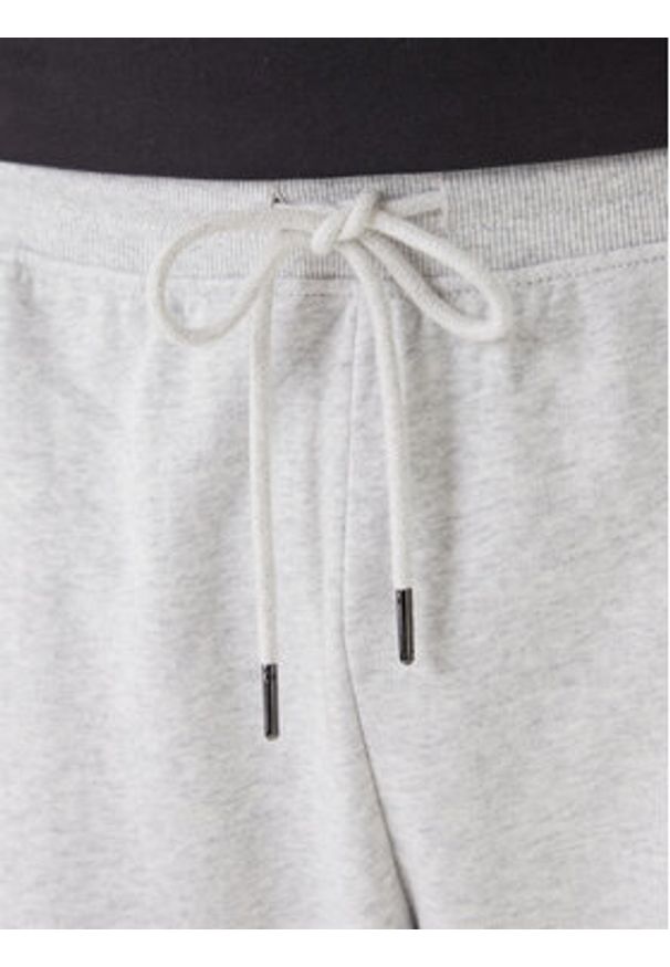 TOMMY HILFIGER - Tommy Hilfiger Spodnie dresowe UM0UM03664 Szary Regular Fit. Kolor: szary. Materiał: bawełna
