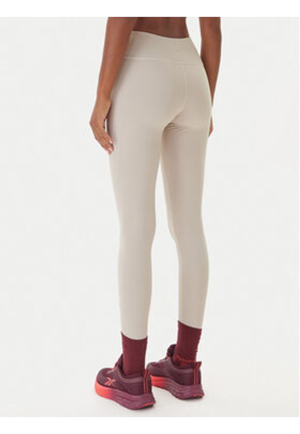 Reebok Legginsy RK25311CCW Beżowy Slim Fit. Kolor: beżowy. Materiał: syntetyk