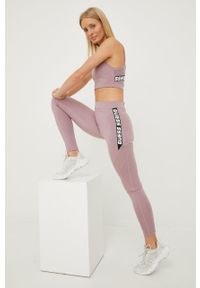 Guess biustonosz sportowy kolor fioletowy. Kolor: fioletowy. Materiał: skóra. Rodzaj stanika: odpinane ramiączka. Wzór: nadruk #3