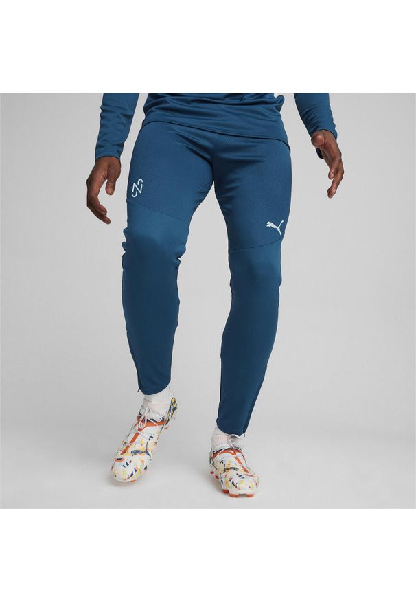Puma - Piłkarskie spodnie treningowe PUMA x NEYMAR JR Creativity PUMA. Kolor: pomarańczowy, wielokolorowy, niebieski, żółty. Sport: piłka nożna
