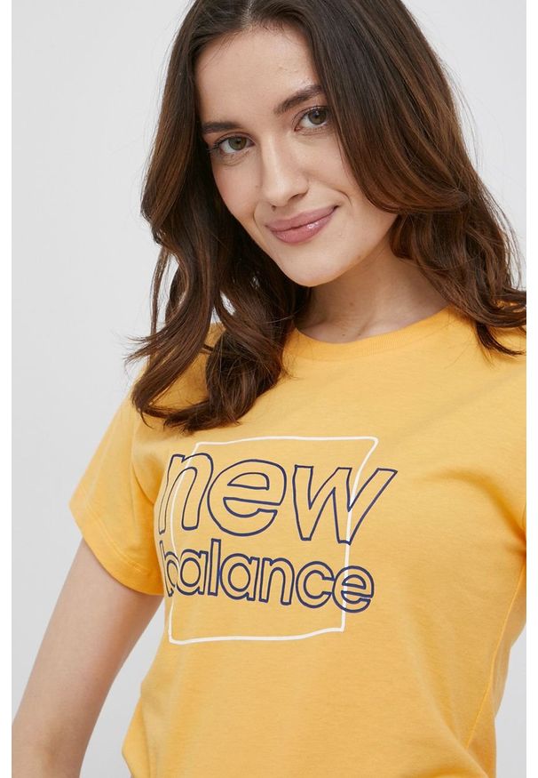 New Balance t-shirt WT21801VAC damski kolor żółty. Kolor: żółty. Wzór: nadruk