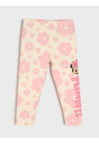 Sinsay - Bawełniane legginsy z nadrukiem Minnie Mouse - kremowy. Kolor: kremowy. Materiał: bawełna. Wzór: motyw z bajki, nadruk #1