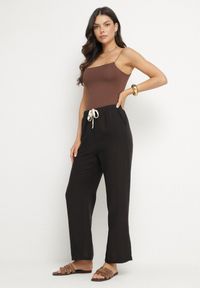 Born2be - Czarne Spodnie o Szerokim Kroju z Gumką i Wiązaniem w Talii Mirastra. Okazja: na co dzień, na spacer. Kolor: czarny. Styl: sportowy, klasyczny, elegancki, casual #7