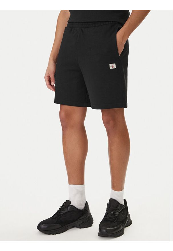 Calvin Klein Jeans Szorty sportowe Badge LV04RF282G Czarny Regular Fit. Kolor: czarny. Materiał: bawełna. Styl: sportowy