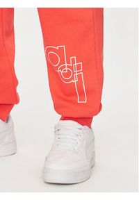 Adidas - adidas Spodnie dresowe Graphic Print IS2009 Czerwony Regular Fit. Kolor: czerwony. Materiał: bawełna. Wzór: nadruk #5