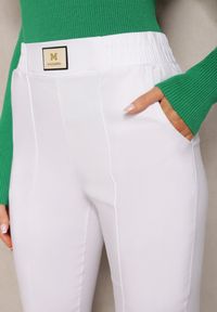 Renee - Białe Spodnie High Waist z Elastycznego Materiału Wykończone Gumką Rigadona. Stan: podwyższony. Kolor: biały. Materiał: materiał. Styl: elegancki