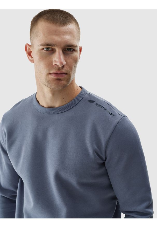 4f - 4F Bluza dresowa nierozpinana bez kaptura męska - niebieska XXL. Okazja: na co dzień. Typ kołnierza: bez kaptura. Kolor: niebieski. Materiał: dresówka. Wzór: gładki, ze splotem. Styl: sportowy, casual, klasyczny