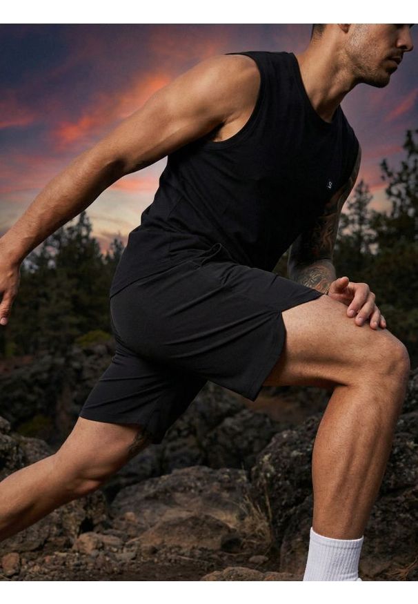 Sinsay - Szorty sportowe SNSY PERFORMANCE - czarny. Kolor: czarny. Styl: sportowy