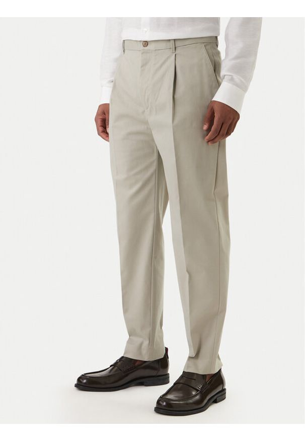 Calvin Klein Chinosy LV04LE612G Beżowy Slim Fit. Kolor: beżowy. Materiał: bawełna