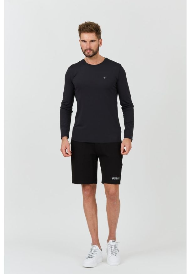 Guess - GUESS Czarny longsleeve New Tech Str T. Kolor: czarny. Długość rękawa: długi rękaw