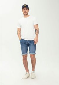Volcano - Niebieskie szorty jeansowe męskie z prostą nogawką D-LENZO. Kolor: niebieski, wielokolorowy, szary. Materiał: jeans. Długość: krótkie. Styl: street, klasyczny #1