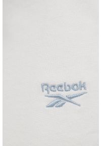 Reebok Classic Spodnie bawełniane damskie kolor kremowy gładkie. Stan: podwyższony. Kolor: beżowy. Materiał: bawełna. Wzór: gładki