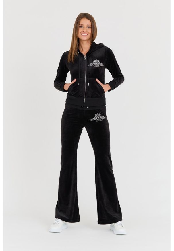 Juicy Couture - JUICY COUTURE Czarne spodnie Arched Metallic Layla. Kolor: czarny