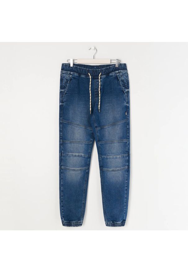 Sinsay - Jeansy slim jogger - Niebieski. Kolor: niebieski