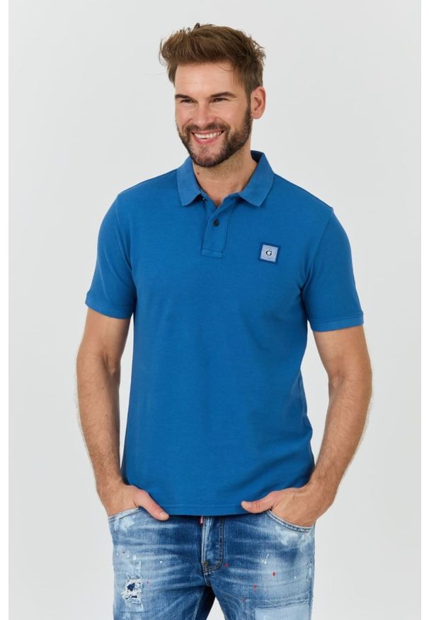 Guess - GUESS Niebieskie męskie polo Washed, Rozmiar XXL. Typ kołnierza: polo. Kolor: niebieski