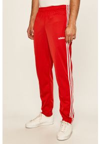 Adidas - adidas - Spodnie. Kolor: czerwony. Materiał: tkanina, poliester. Wzór: aplikacja #1