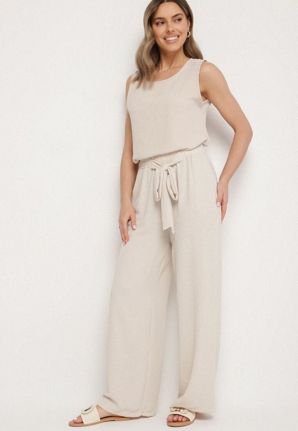 Born2be - Jasnobeżowe Szerokie Spodnie z Wiskozą Wiązane w Pasie Zilenna. Okazja: na co dzień. Kolor: beżowy. Materiał: wiskoza. Styl: elegancki, casual, klasyczny