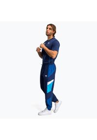 VENUM - Spodnie męskie Venum X Top Rank Original Tracksuit. Kolor: niebieski