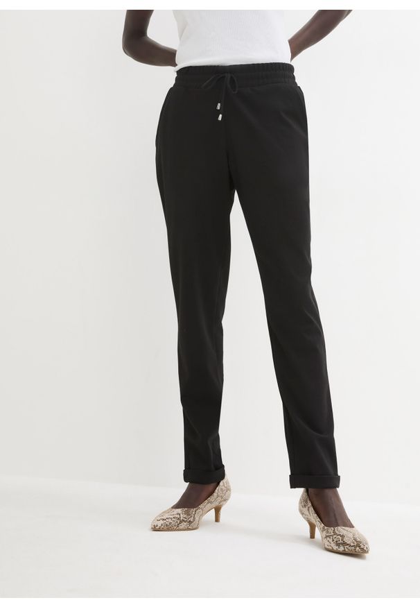 bonprix - Spodnie z elastycznym paskiem w talii. Kolor: czarny. Materiał: wiskoza. Długość: długie