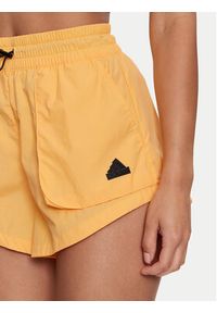 Adidas - adidas Szorty sportowe City Escape Summer IS0662 Żółty Loose Fit. Kolor: żółty. Materiał: syntetyk #6