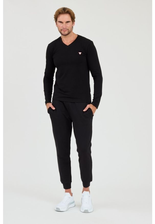 Guess - GUESS Czarny longsleeve Core Tee. Kolor: czarny. Długość rękawa: długi rękaw
