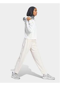 Adidas - adidas Spodnie dresowe Train Essentials IS3969 Różowy Loose Fit. Kolor: różowy. Materiał: syntetyk #4