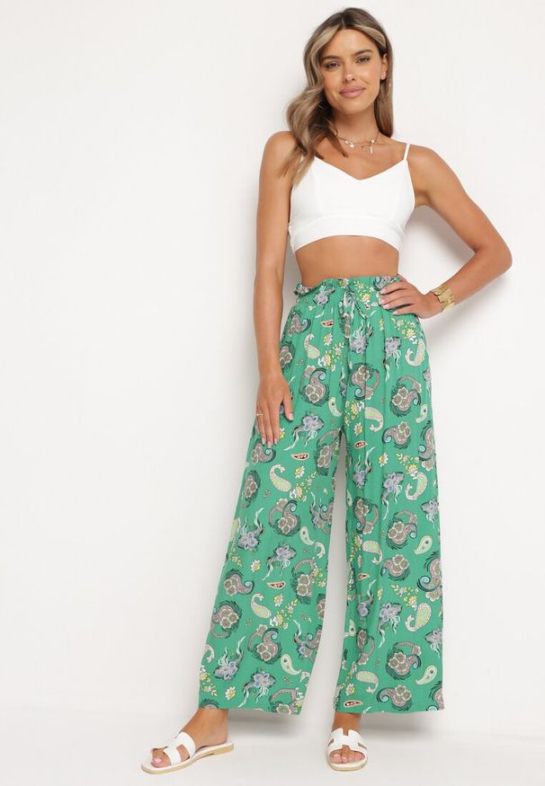 Born2be - Zielone Spodnie z Bawełny z w Stylu Boho z Szerokimi Nogawkami i Gumką w Talii Jelvia. Kolor: zielony. Materiał: bawełna. Sezon: lato. Styl: boho