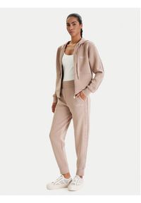 Guess Spodnie dresowe W6RB45 KBYE2 Beżowy Regular Fit. Kolor: beżowy. Materiał: syntetyk #4