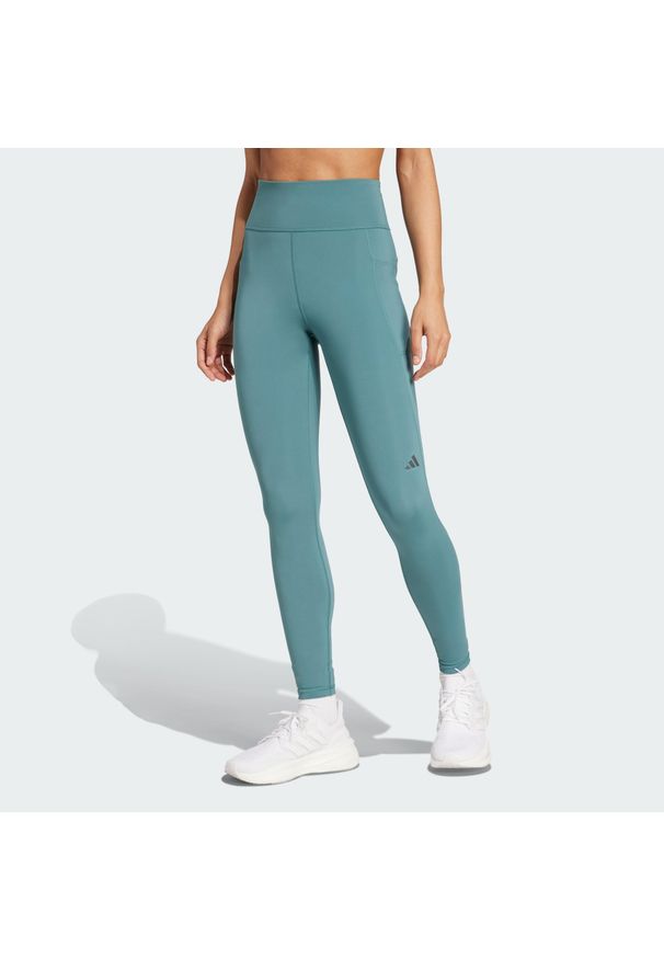 Adidas - Legginsy Own the Run 7/8. Kolor: niebieski. Materiał: materiał. Wzór: gładki. Sport: bieganie