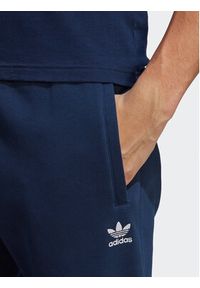 Adidas - adidas Spodnie dresowe Trefoil Essentials Joggers IA4835 Niebieski Slim Fit. Kolor: niebieski. Materiał: dresówka, bawełna