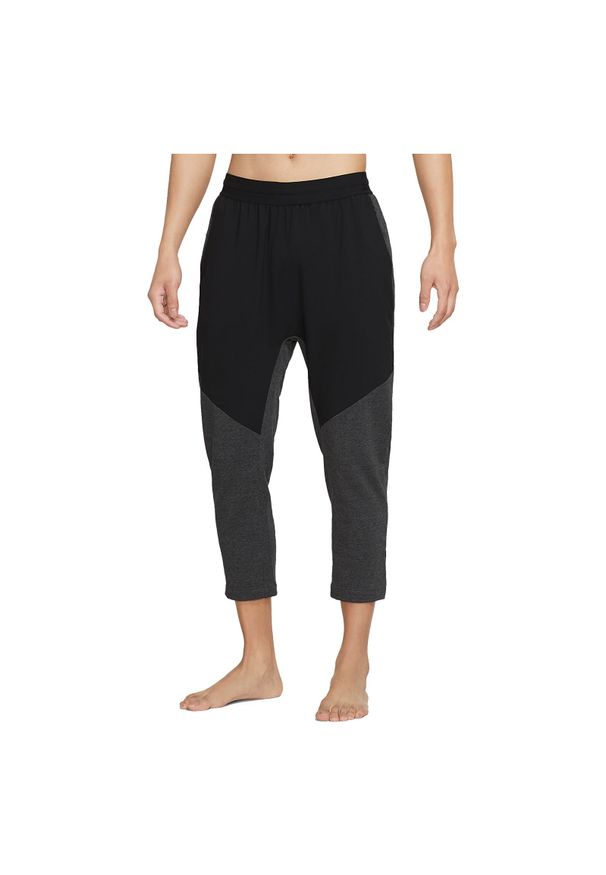 Spodnie treningowe męskie Nike Yoga Dri-FIT DH1933. Materiał: materiał, włókno, dzianina, bawełna, poliester. Technologia: Dri-Fit (Nike). Wzór: gładki