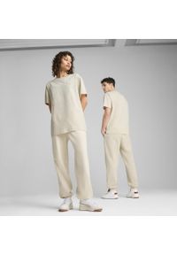 Puma - Spodnie dresowe unisex Essentials Elevated PUMA Alpine Snow White. Kolor: biały. Materiał: dresówka. Sport: turystyka piesza